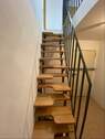 Wechselstufentreppe ins Untergeschoss - 