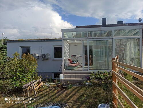 Blick vom Garten auf das Haus - Bungalow in Mombach zu vermieten