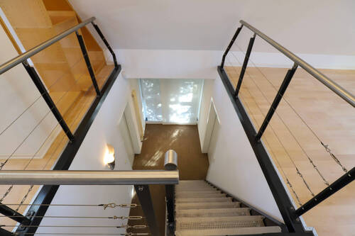 Treppenabgang-Blick Studio Dachgeschoss - 
