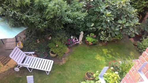 Blick in den Garten im EG - 2 Zimmer Etagenwohnung zur Miete in Krefeld