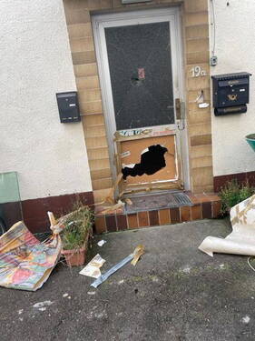 Die Eingangstür zum Haus 19a - 