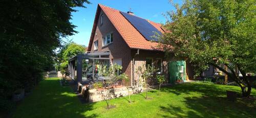 Hausansicht_Seite - Mehrfamilienhaus, Wohnhaus mit 253,00 m² in Ottersberg zum Kaufen