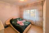 Schlafzimmer_1_Whg_EG - 