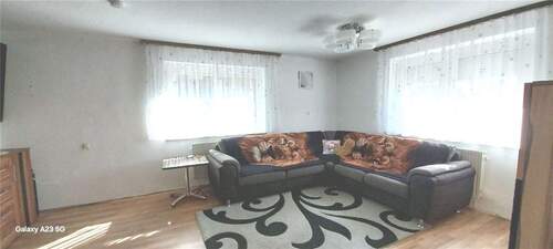 Wohnzimmer EG - 9 Zimmer Einfamilienhaus in Wiesenbach