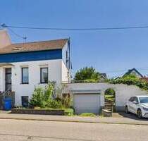 BECKINGEN: WOHNHAUS MIT GARTEN UND GARAGE!