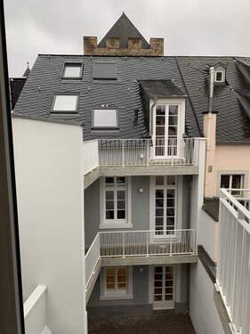 VHS Rückwärtige Ansicht - Mehrfamilienhaus, Wohnhaus in Trier zum Kaufen