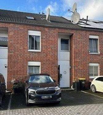 Außenansicht - Familienfreundliches Reihenmittelhaus mit Garten im Ahlener Süden!