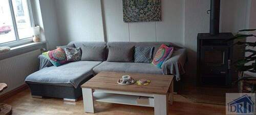 Wohnzimmer - Gemütliche Eigentumswohnung mit Kaminofen