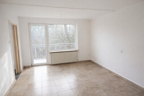 Wohn-/Esszimmer mit Balkonzugang - OG - 