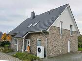 Beispielabbildung mit Sonderleistungen - Einfamilienhaus mit 149,00 m² in Beldorf zum Kaufen