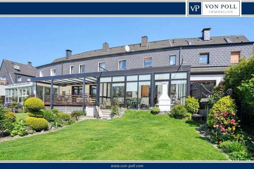 Gartenansicht - Hübsches Reihenmittelhaus mit traumhaftem Garten in Harpen