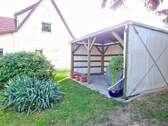 überdachte Terrasse - 