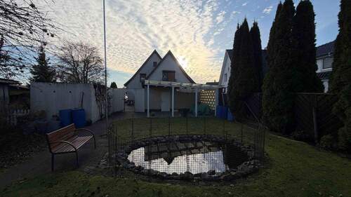 Grundstück - Haushinteransicht - 8 Zimmer Mehrfamilienhaus, Wohnhaus in Heist