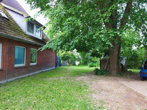 Gartenansicht - Mehrfamilienhaus, Wohnhaus in Wohltorf