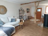 Wohnzimmer mit Pelletofen - 3 Zimmer Reihenmittelhaus in Jürgenshagen OT Wokrent