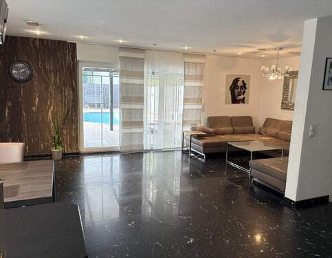 Wohnzimmer Bild 1 - 4 Zimmer Einfamilienhaus in Neu-Isenburg