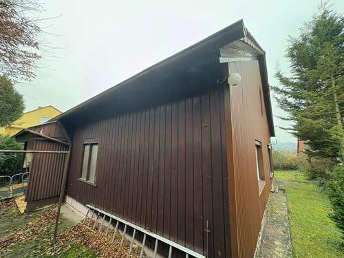 Gebäudeansicht - Einfamilienhaus mit 100,00 m&sup2; in Dingolshausen zum Kaufen