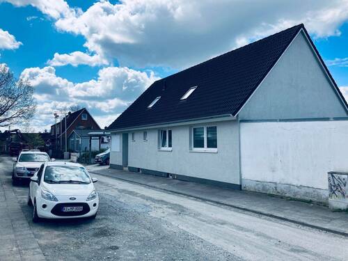 Straßenansicht Am Neuhof 6 - Einfamilienhaus in Lübeck