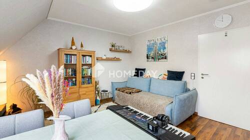 Wohnzimmer 1 - 2 Zimmer Etagenwohnung in Rodgau