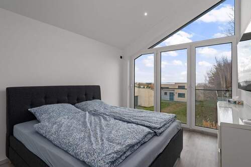 Erstes Schlafzimmer im Dachgeschoss (13,10m²) - 