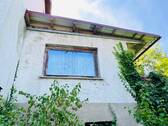 eingeschossiger Anbau mit Unterkellerung auf der Nord- bzw. Gartenseite - 