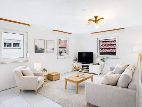 Wohnzimmer gestaged - Einfamilienhaus mit 88,60 m&sup2; in Winnenden zum Kaufen