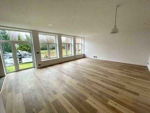 Wohnzimmer mit Zugang zur Terrasse Flachbau - 