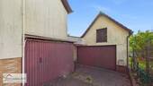 Doppelgarage + Holzlagerplatz - 