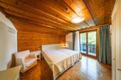 1. Schlafzimmer im Dachgeschoss.jpg - 5 Zimmer Einfamilienhaus zum Kaufen in Missen-Wilhams