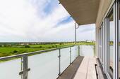 Balkon - MODERNES INVESTMENT Vermietete Neubauwohnung mit erstklassigem Standard Südbalkon & Stellplatz