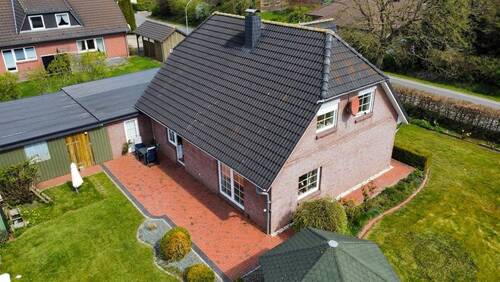Drohnenaufnahme Terrasse - Einfamilienhaus mit 129,00 m&sup2; in Treia zum Kaufen
