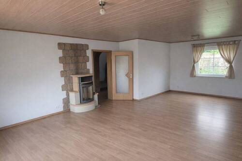 Wohnzimmer mit Holzofen - 