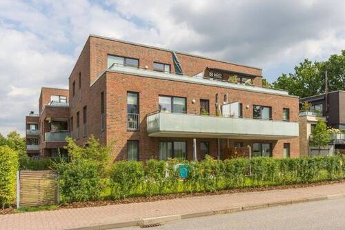 Hausansicht - Zentrale 3-Zimmer-Neubauwohnung mit Süd-West Balkon