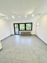 Wohn- und Esszimmer - Stilvolle 2-Zimmer-Eigentumswohnung mit KFZ-Stellplatz im begehrten Saarbrücker Stadtteil Rotenbühl