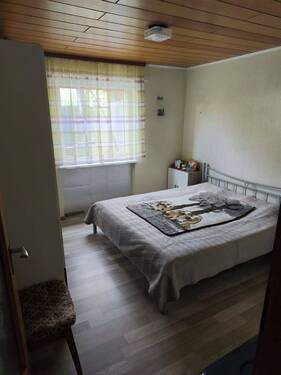 Schlafzimmer - Einfamilienhaus mit 235,00 m&sup2; in Stadtallendorf zum Kaufen