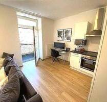 Frei ab sofort 2 - Zimmer-Wohnung im 1. Obergeschoss mit Aufzug Einbauküche Balkon - Bitburg