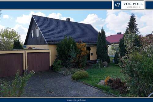 Titelbild - Wohnen mit Weitblick: Großzügiges Einfamilienhaus mit Garten, Terrasse und Erweiterungsmöglichkeiten