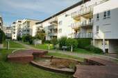 Rückseite - Attraktive 4-Zimmer-Erdgeschosswohnung mit Terrasse und viel Platz zum Wohlfühlen