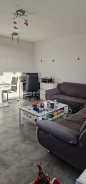 Wohnzimmer 1 - Etagenwohnung mit 60,00 m&sup2; in Kriftel zum Kaufen