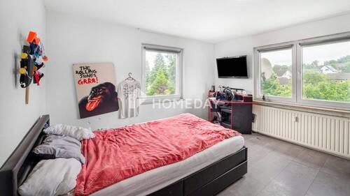 1. OG Schlafzimmer 1 - 