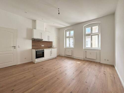 Wohnzimmer - 1 Zimmer Etagenwohnung zum Kaufen in Berlin