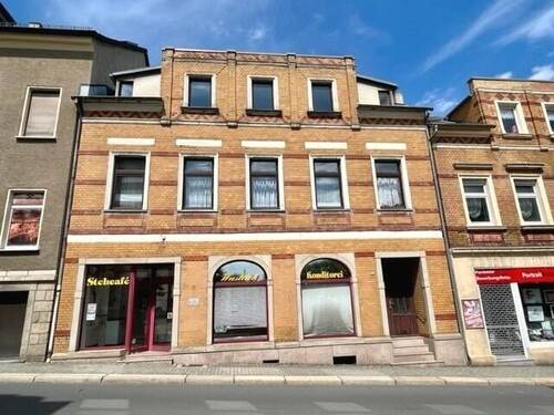 Hausansicht - Mehrfamilienhaus mit Laden und 2 freien