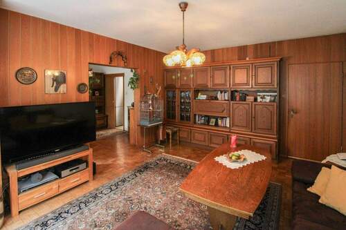 Wohnzimmer EG - 7 Zimmer Einfamilienhaus zum Kaufen in Calw