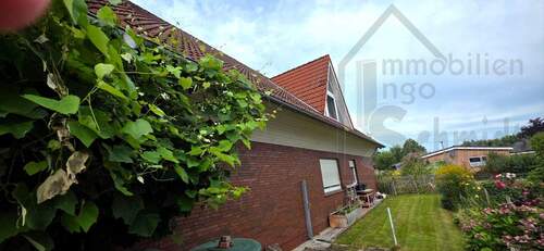 Ostansicht - 8 Zimmer Einfamilienhaus zum Kaufen in Ostrhauderfehn