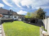 Gartenblick mit Doppelcarport - Freistehendes Zweifamilienhaus in toller Lage von Solingen-Gräfrath mit Wärmepumpe, Pool, Sauna uvm.