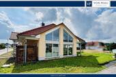 Titel - Modern Mix - lichtdurchflutetes Einfamilienhaus mit Kamin, edler Ausstattung und Barrierefreiheit