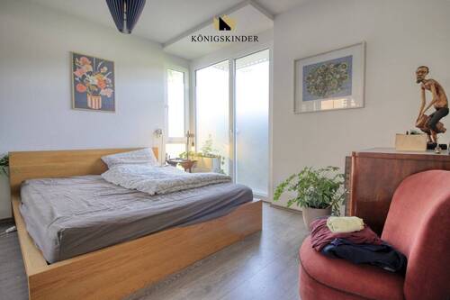 Schlafzimmer mit kleinem Freisitz im grünen - 