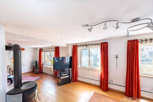 Wohnzimmer - 6 Zimmer Einfamilienhaus zum Kaufen in Hessigheim