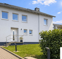 Neuwertige Erdgeschosswohnung mit Terrasse, Garten und zwei Carport-Stellplätzen in Bad Kreuznach