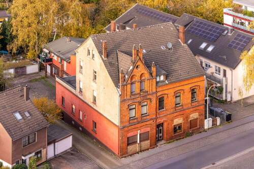 Außenansicht - Haupthaus - Projektjäger aufgepasst: MFH in Herne mit Umbau-Potenzial!